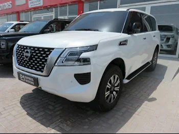 Nissan  Patrol  XE  2023  Automatic  49,000 Km  6 Cylinder  Four Wheel Drive (4WD)  SUV  White  With Warranty