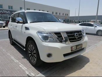 Nissan  Patrol  Platinum  2015  Automatic  203,000 Km  8 Cylinder  Four Wheel Drive (4WD)  SUV  White  With Warranty