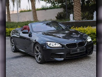 BMW  M-Series  6  2015  Automatic  9,000 Km  8 Cylinder  Rear Wheel Drive (RWD)  Convertible  Black