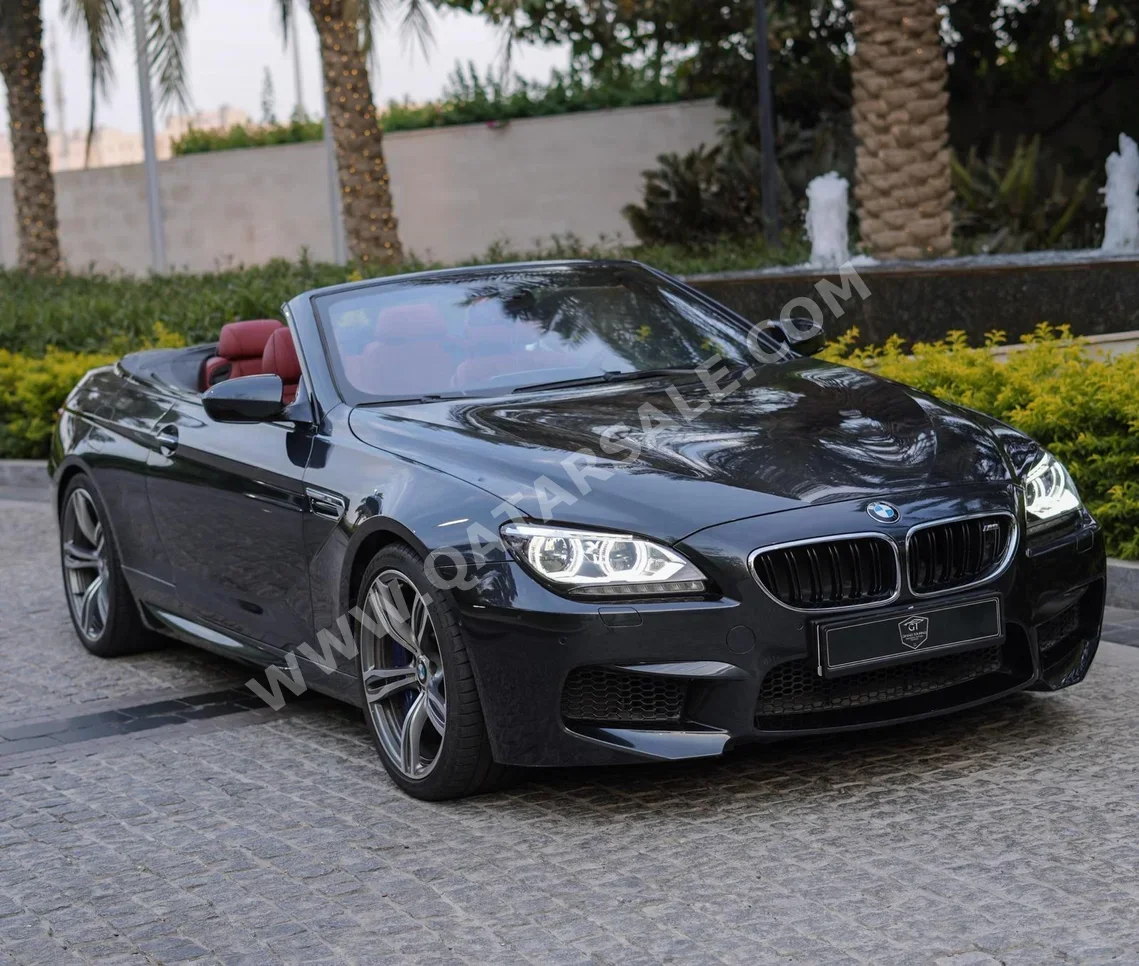 BMW  M-Series  6  2015  Automatic  9,000 Km  8 Cylinder  Rear Wheel Drive (RWD)  Convertible  Black