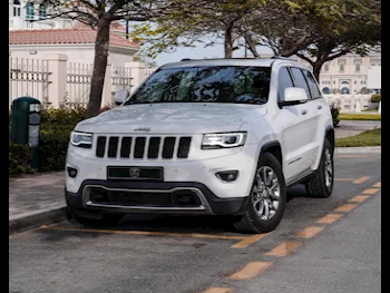 Jeep  Grand Cherokee  Limited  2014  Automatic  110,000 Km  8 Cylinder  Four Wheel Drive (4WD)  SUV  White