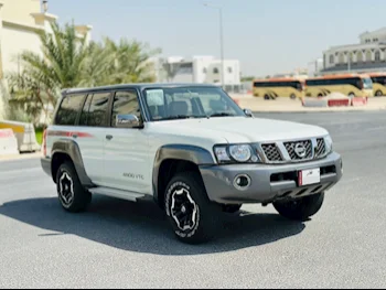 Nissan  Patrol  Super Safari  2022  Automatic  19,000 Km  6 Cylinder  Four Wheel Drive (4WD)  SUV  White  With Warranty