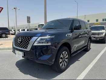Nissan  Patrol  XE  2023  Automatic  34,000 Km  6 Cylinder  Four Wheel Drive (4WD)  SUV  Dark Blue  With Warranty