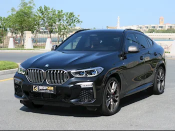 BMW  X-Series  X6 M  2021  Automatic  99,000 Km  8 Cylinder  Four Wheel Drive (4WD)  SUV  Black  With Warranty