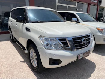 Nissan  Patrol  XE  2019  Automatic  185,000 Km  6 Cylinder  Four Wheel Drive (4WD)  SUV  White