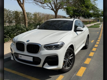 BMW  X-Series  X4  2020  Automatic  92,000 Km  6 Cylinder  Rear Wheel Drive (RWD)  SUV  White  With Warranty