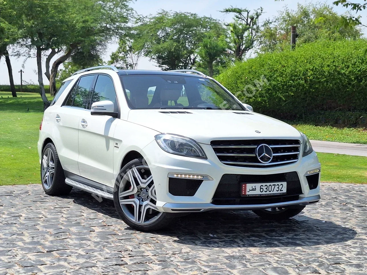 Mercedes-Benz  ML  63 AMG  2013  Automatic  114,000 Km  8 Cylinder  All Wheel Drive (AWD)  SUV  White