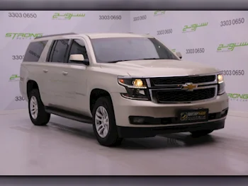 Chevrolet  Suburban  2015  Automatic  100,000 Km  8 Cylinder  Four Wheel Drive (4WD)  SUV  Gold