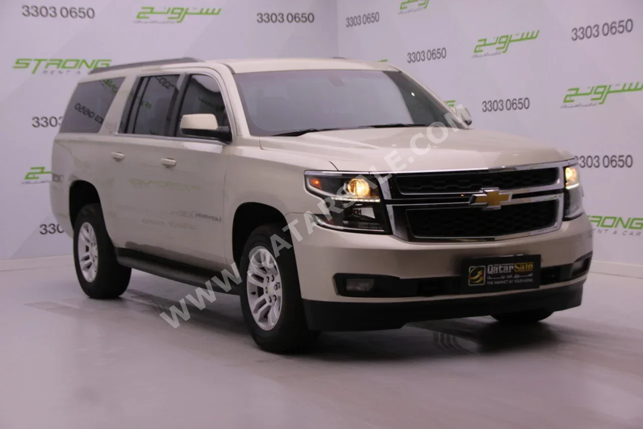 Chevrolet  Suburban  2015  Automatic  100,000 Km  8 Cylinder  Four Wheel Drive (4WD)  SUV  Gold