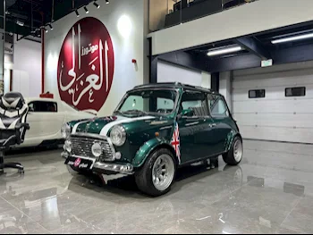 Mini  Cooper  1995  Manual  87,000 Km  4 Cylinder  Front Wheel Drive (FWD)  Classic  Green