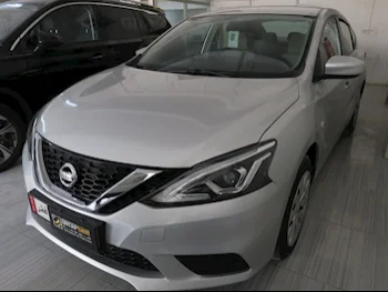 Nissan  Sentra  2021  Automatic  29,000 Km  4 Cylinder  Front Wheel Drive (FWD)  Sedan  Silver