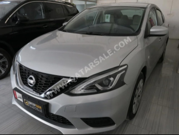Nissan  Sentra  2021  Automatic  50,000 Km  4 Cylinder  Front Wheel Drive (FWD)  Sedan  Silver