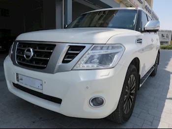 Nissan  Patrol  Platinum  2014  Automatic  113,000 Km  8 Cylinder  Four Wheel Drive (4WD)  SUV  White