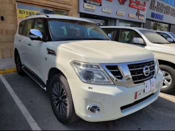 Nissan  Patrol  Platinum  2016  Automatic  221,000 Km  8 Cylinder  Four Wheel Drive (4WD)  SUV  White