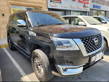 Nissan  Patrol  Platinum  2014  Automatic  215,000 Km  8 Cylinder  Four Wheel Drive (4WD)  SUV  Black