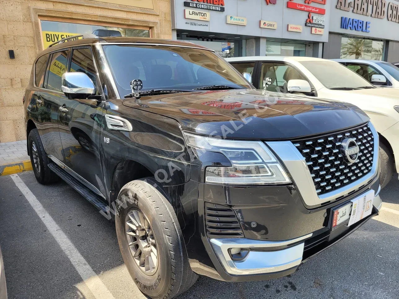 Nissan  Patrol  Platinum  2014  Automatic  215,000 Km  8 Cylinder  Four Wheel Drive (4WD)  SUV  Black
