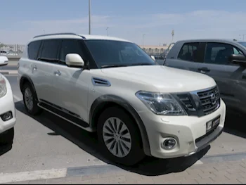 Nissan  Patrol  Titanium  2018  Automatic  95,000 Km  8 Cylinder  Four Wheel Drive (4WD)  SUV  White