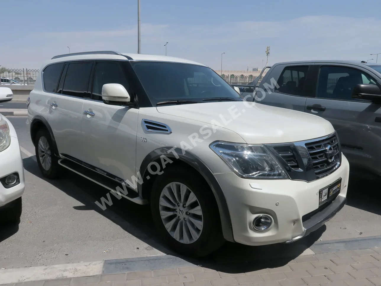 Nissan  Patrol  Titanium  2018  Automatic  95,000 Km  8 Cylinder  Four Wheel Drive (4WD)  SUV  White