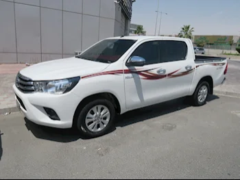 Toyota  Hilux  2022  Automatic  49,000 Km  4 Cylinder  Four Wheel Drive (4WD)  Pick Up  White  With Warranty