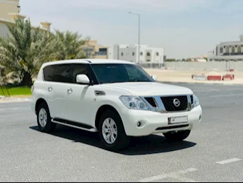Nissan  Patrol  SE  2014  Automatic  233,000 Km  8 Cylinder  Four Wheel Drive (4WD)  SUV  White