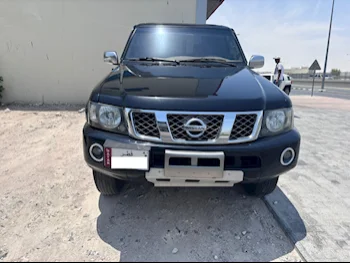 Nissan  Patrol  Safari  2009  Automatic  390,000 Km  6 Cylinder  Four Wheel Drive (4WD)  SUV  Black