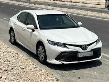 Toyota  Camry  LE  2019  Automatic  190,000 Km  4 Cylinder  Front Wheel Drive (FWD)  Sedan  White