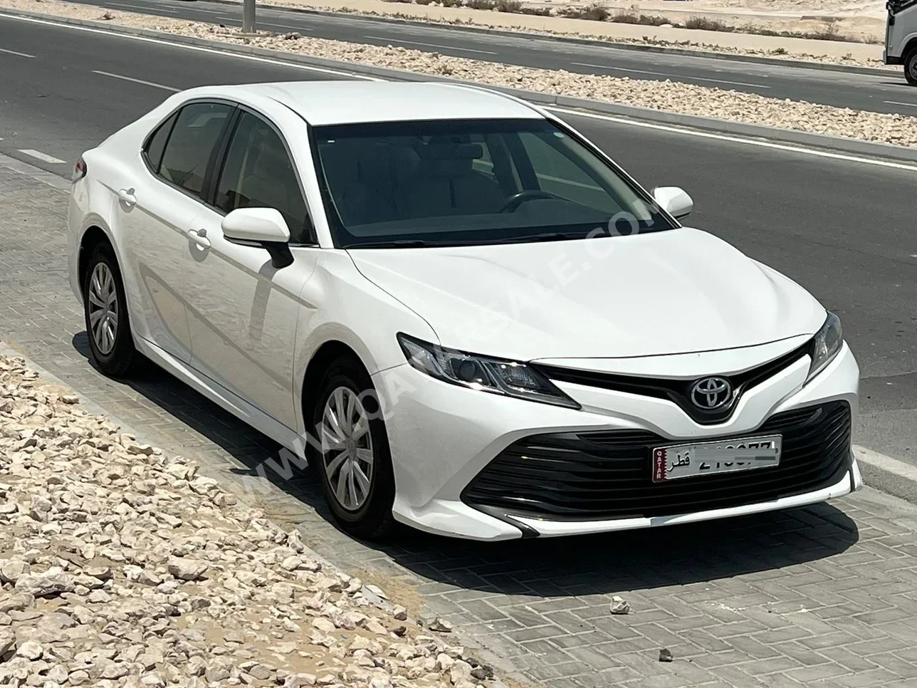 Toyota  Camry  LE  2019  Automatic  190,000 Km  4 Cylinder  Front Wheel Drive (FWD)  Sedan  White