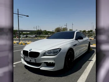 BMW  6-Series  640i Gran Coupe  2013  Automatic  112,500 Km  6 Cylinder  Rear Wheel Drive (RWD)  Coupe / Sport  White Matte