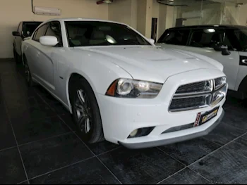 Dodge  Charger  RT  2015  Automatic  221,000 Km  6 Cylinder  Rear Wheel Drive (RWD)  Sedan  White