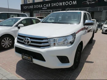 Toyota  Hilux  2022  Manual  61,000 Km  4 Cylinder  Front Wheel Drive (FWD)  Pick Up  White