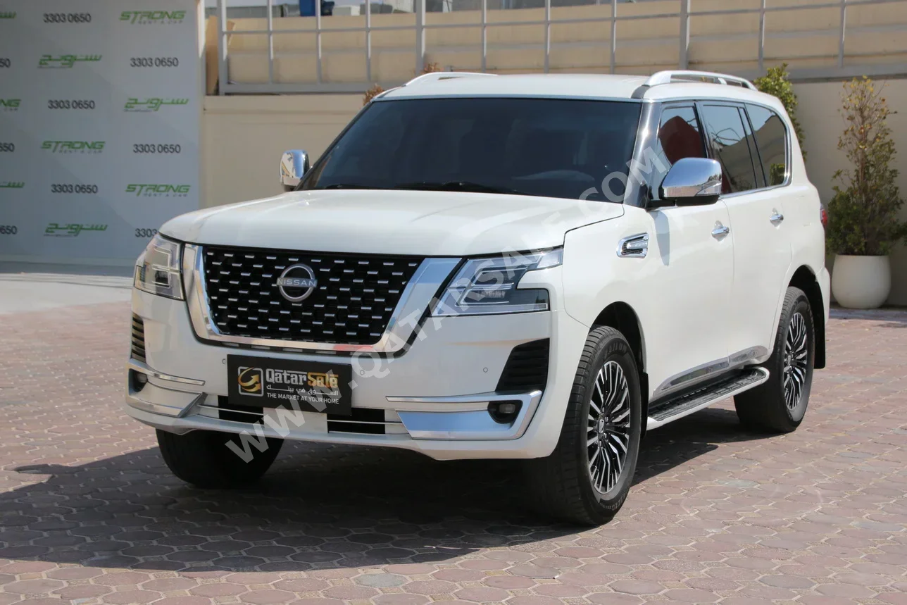Nissan  Patrol  XE  2018  Automatic  143,000 Km  6 Cylinder  Four Wheel Drive (4WD)  SUV  White