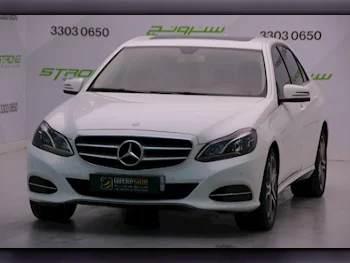 Mercedes-Benz  E-Class  200  2016  Automatic  78,000 Km  4 Cylinder  Rear Wheel Drive (RWD)  Sedan  White