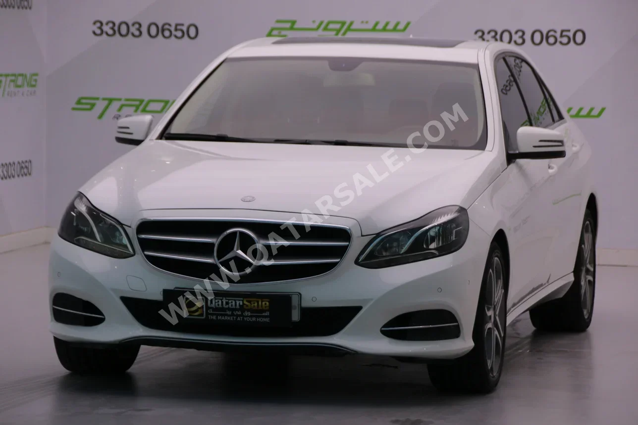 Mercedes-Benz  E-Class  200  2016  Automatic  78,000 Km  4 Cylinder  Rear Wheel Drive (RWD)  Sedan  White