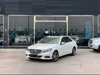 Mercedes-Benz  E-Class  200  2016  Automatic  78,000 Km  4 Cylinder  Rear Wheel Drive (RWD)  Sedan  White