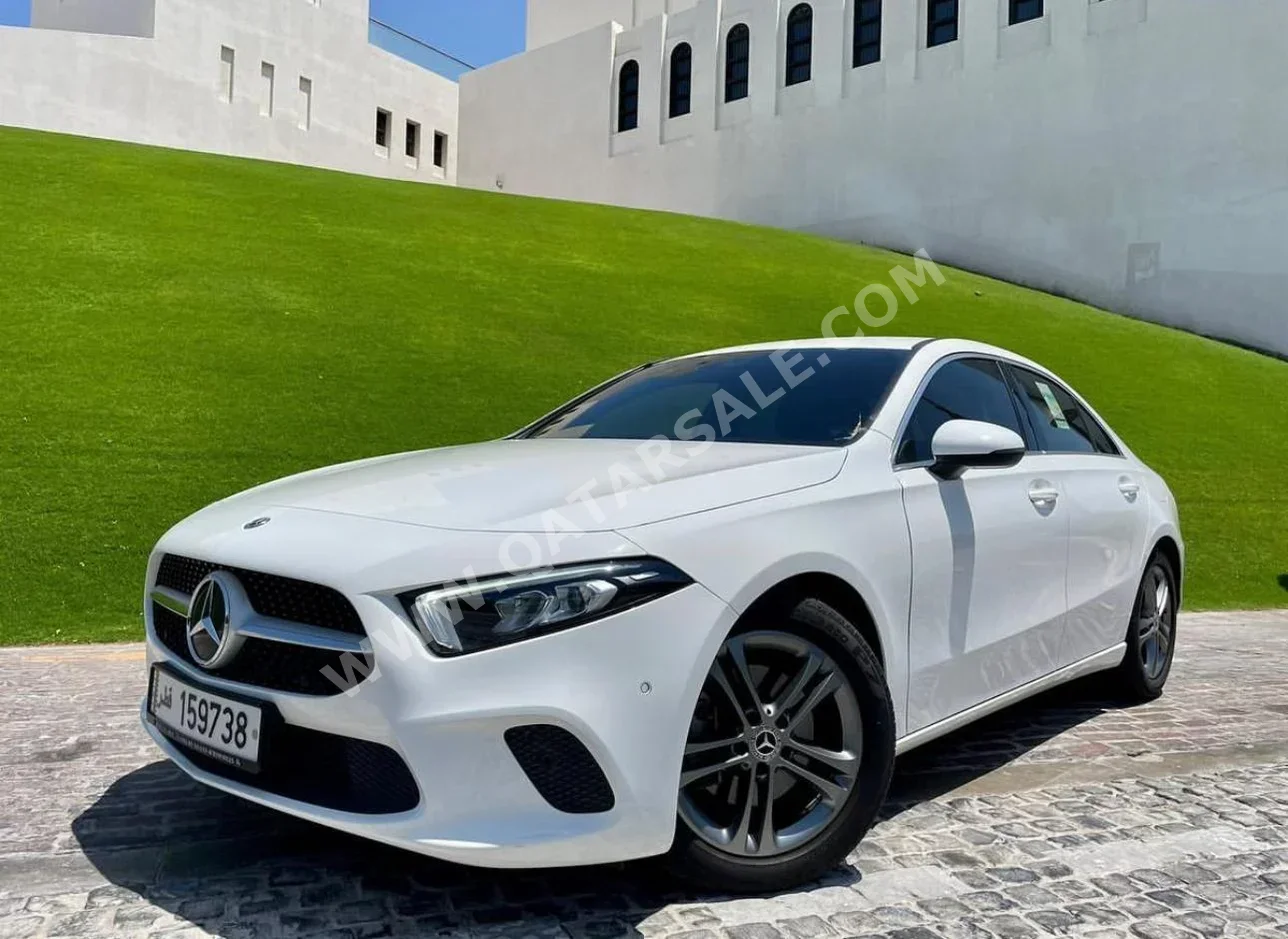 Mercedes-Benz  A-Class  250  2019  Automatic  71,000 Km  4 Cylinder  Rear Wheel Drive (RWD)  Hatchback  White