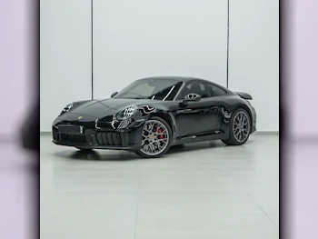بورش  911  كاريرا  2025  اوتوماتيك  1,737 كم  6 سلندر  دفع خلفي  كوبيه \ سبورت  أسود  تحت الضمان