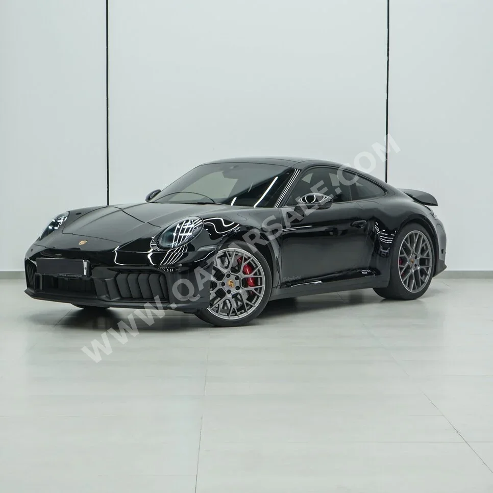 Porsche  911  Carrera  2025  Automatic  1,737 Km  6 Cylinder  Rear Wheel Drive (RWD)  Coupe / Sport  Black  With Warranty
