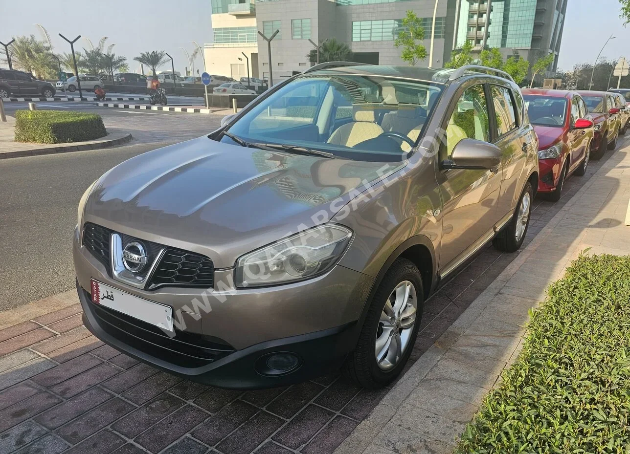 Nissan  Qashqai  SE  2011  Automatic  100,035 Km  4 Cylinder  All Wheel Drive (AWD)  SUV  Brown
