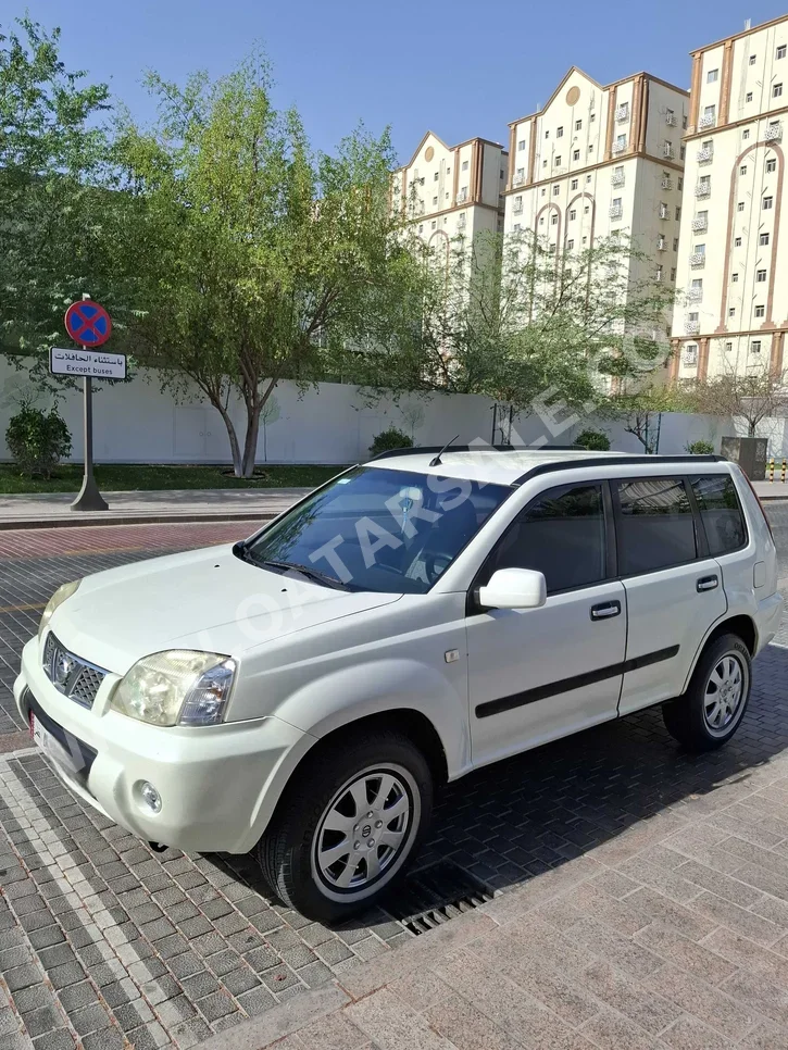 Nissan  X-Trail  2012  Automatic  157,000 Km  4 Cylinder  SUV  White