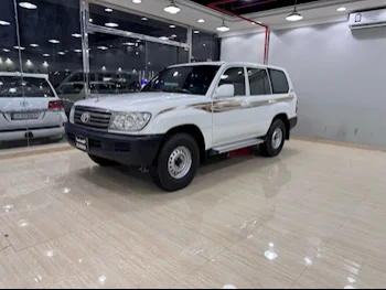 Toyota  Land Cruiser  GX  2006  Manual  350,000 Km  6 Cylinder  Four Wheel Drive (4WD)  SUV  White