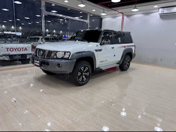 Nissan  Patrol  Super Safari  2024  Automatic  6,000 Km  6 Cylinder  Four Wheel Drive (4WD)  SUV  White  With Warranty