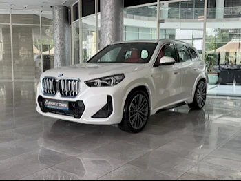 BMW  IX  1  2024  Automatic  0 Km  0 Cylinder  Four Wheel Drive (4WD)  SUV  White  With Warranty