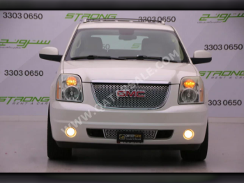 GMC  Yukon  Denali  2011  Automatic  118,000 Km  8 Cylinder  Four Wheel Drive (4WD)  SUV  Pearl