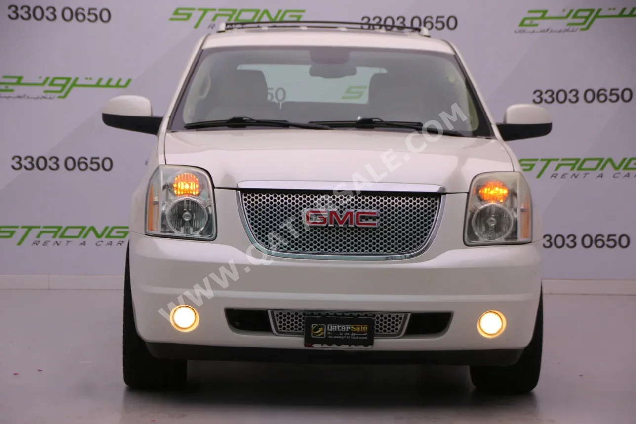 GMC  Yukon  Denali  2011  Automatic  118,000 Km  8 Cylinder  Four Wheel Drive (4WD)  SUV  Pearl