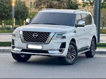Nissan  Patrol  Platinum  2022  Automatic  72,000 Km  8 Cylinder  Four Wheel Drive (4WD)  SUV  White