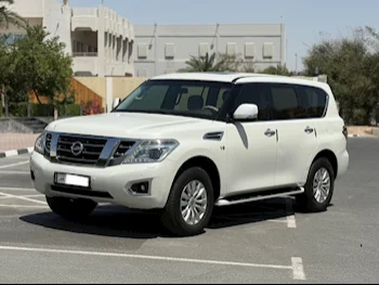 Nissan  Patrol  SE  2016  Automatic  163,000 Km  8 Cylinder  Four Wheel Drive (4WD)  SUV  White