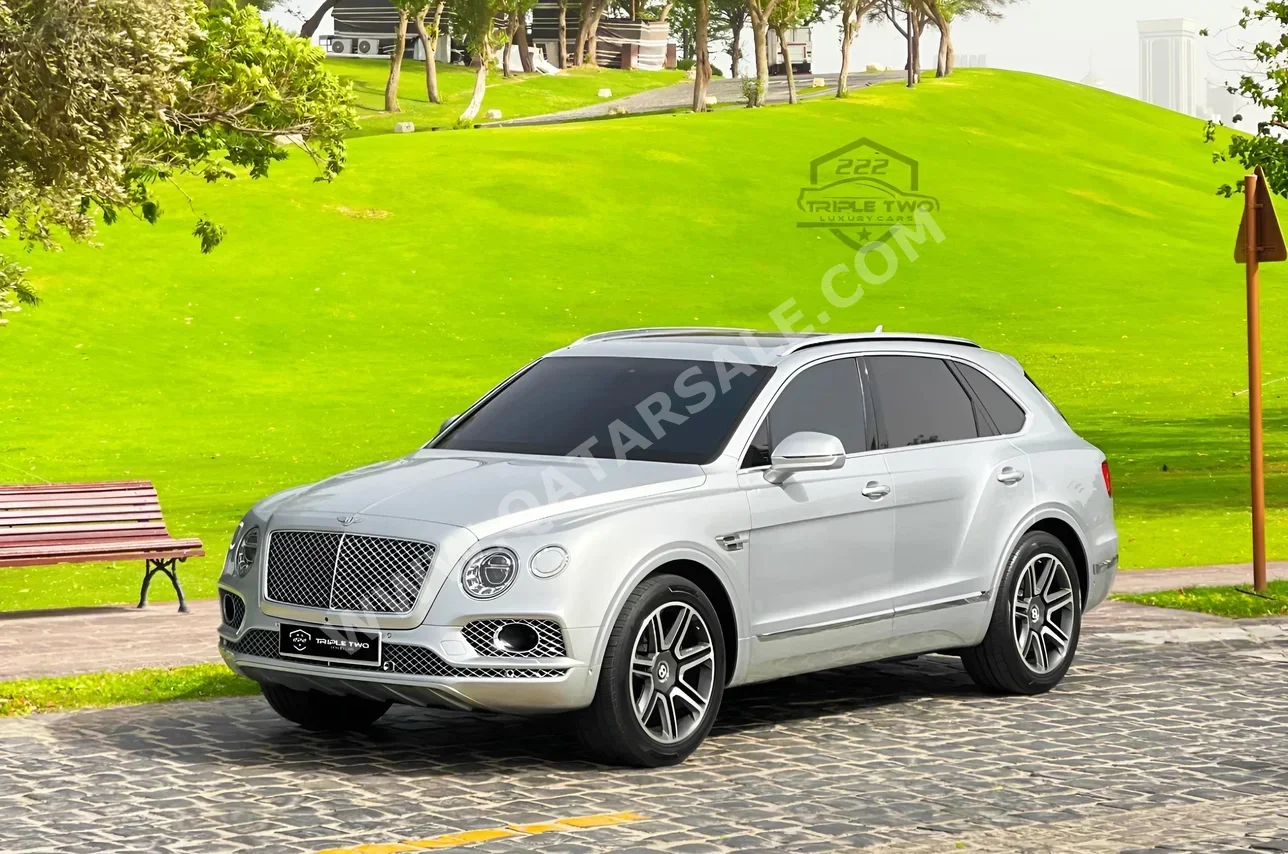 Bentley  Bentayga  2018  Automatic  76,200 Km  12 Cylinder  Four Wheel Drive (4WD)  SUV  Silver