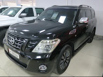 Nissan  Patrol  Platinum  2014  Automatic  231,000 Km  8 Cylinder  Four Wheel Drive (4WD)  SUV  Black