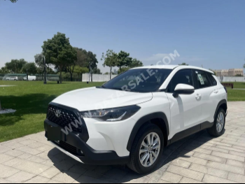 Toyota  Corolla  Cross Hybrid  2023  Automatic  4,248 Km  4 Cylinder  Front Wheel Drive (FWD)  SUV  White  With Warranty