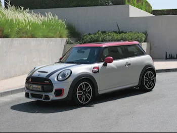 Mini  Cooper  JCW  2016  Automatic  118,000 Km  4 Cylinder  Front Wheel Drive (FWD)  Hatchback  Red and Gray